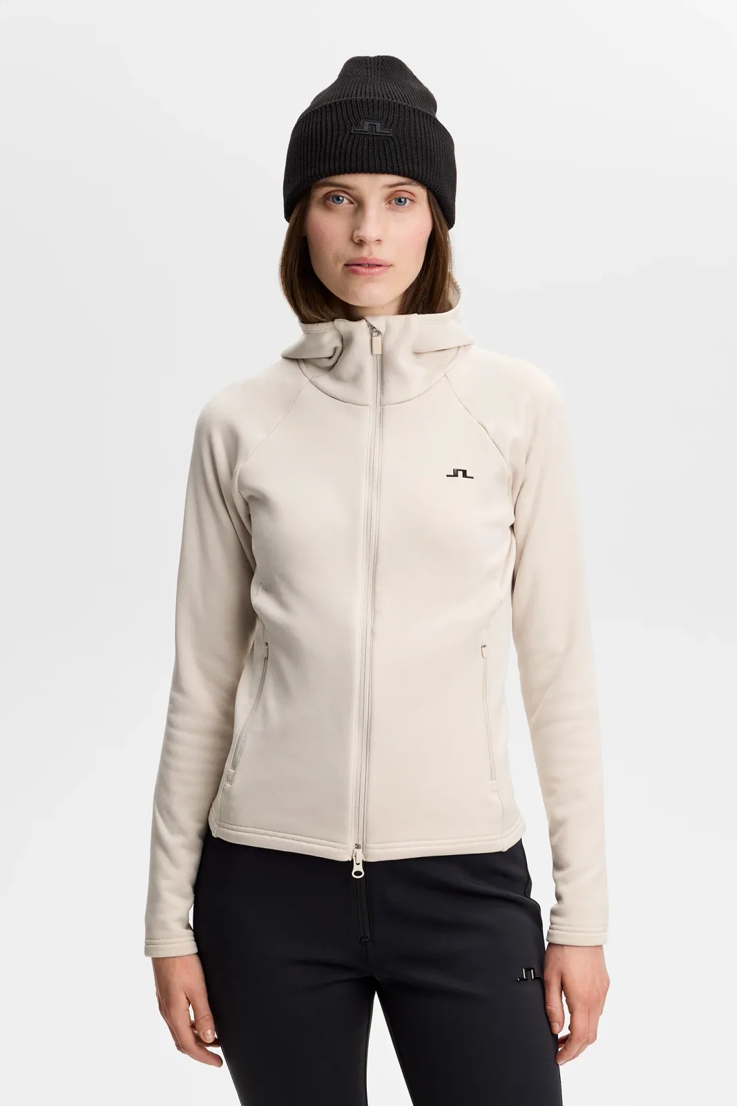 Front view of a model in the grey Portia Polartec Hood