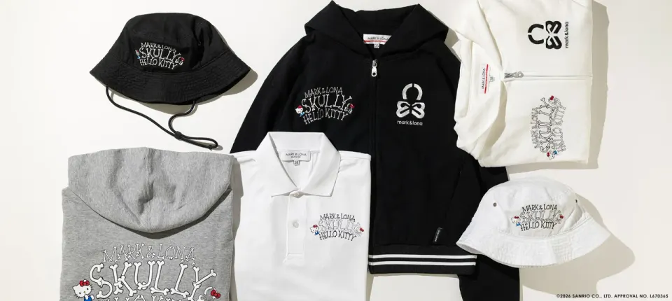 Flat lay of the Hello Kitty collaboration polos, bucket hats and hoodies in black, white and grey