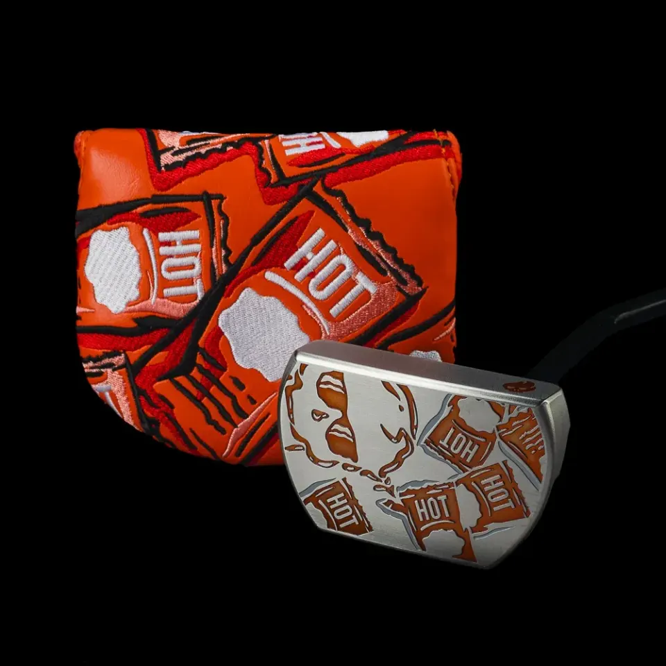 Hot Sauce Boss 2.0 putter with an engraved sauce-packet pattern and matching cover